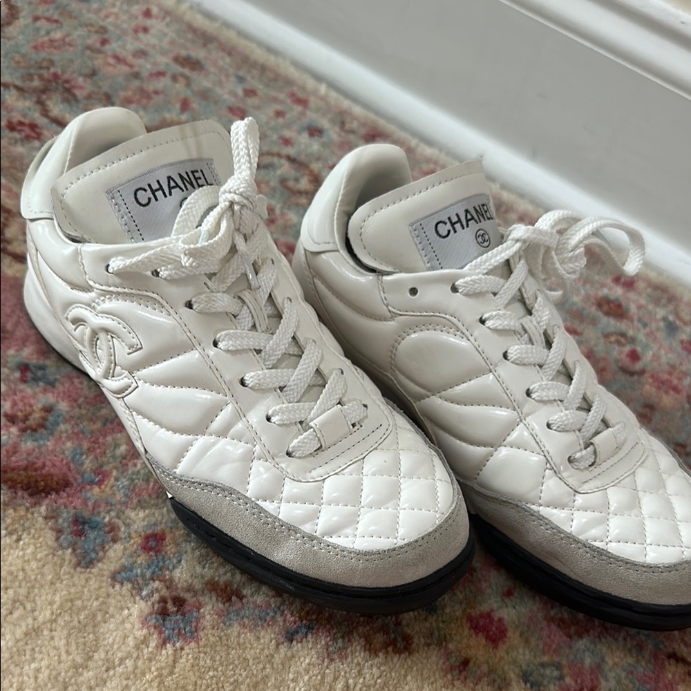 CHANEL Quilted White Sneakers